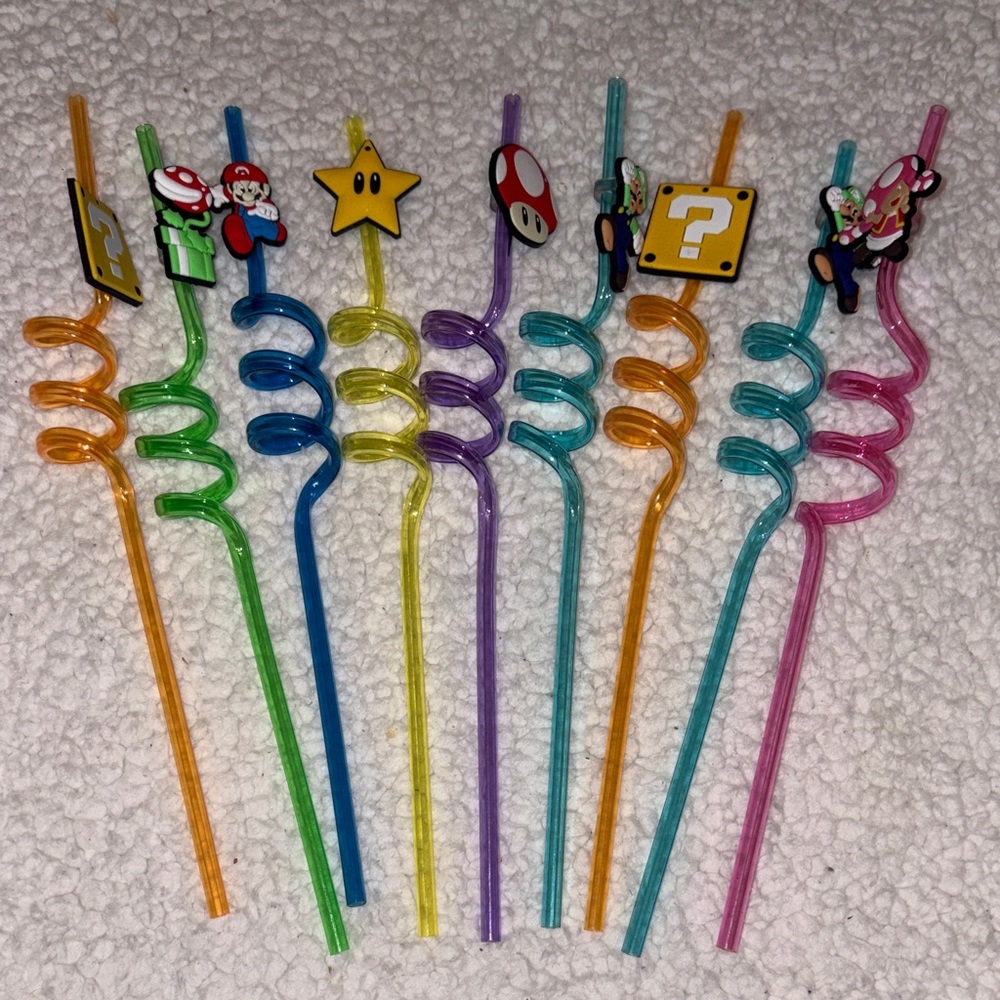 Nintendo Mario Brothers straws with rubber toppers. Never used, in bag